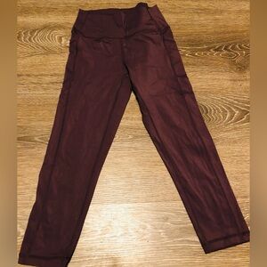 Zyia activewear purple light n’ tight leggings, size 6/8 with pockets